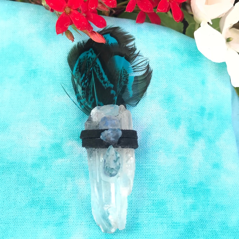 Clear quartz teal feathers blue swirl stone